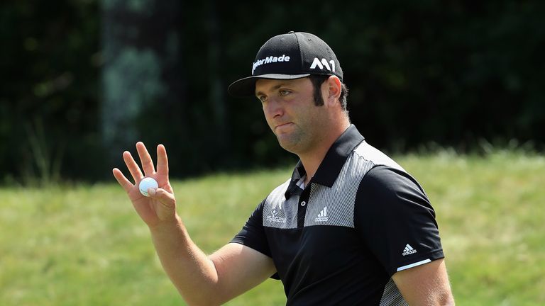 Jon Rahm of Spain acknowledges the crowd after putting on the ninth green during round two of the Dell Technologies Championship