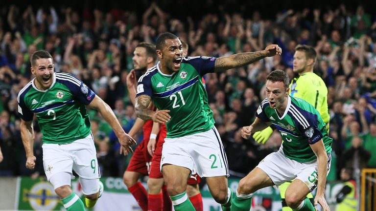 Northern Ireland's Jonny Evans (right) celebrates scoring his side's first goal against the Czech Republic
