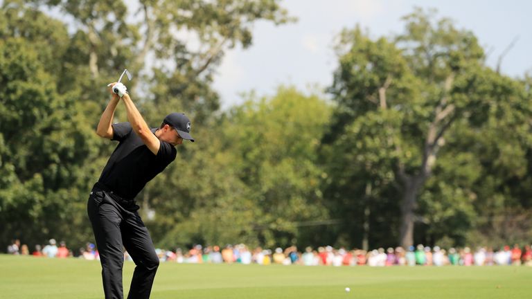 Jordan Spieth of the United States plays a shot on the fourth hole during the third round of the Tour Championship at East Lake