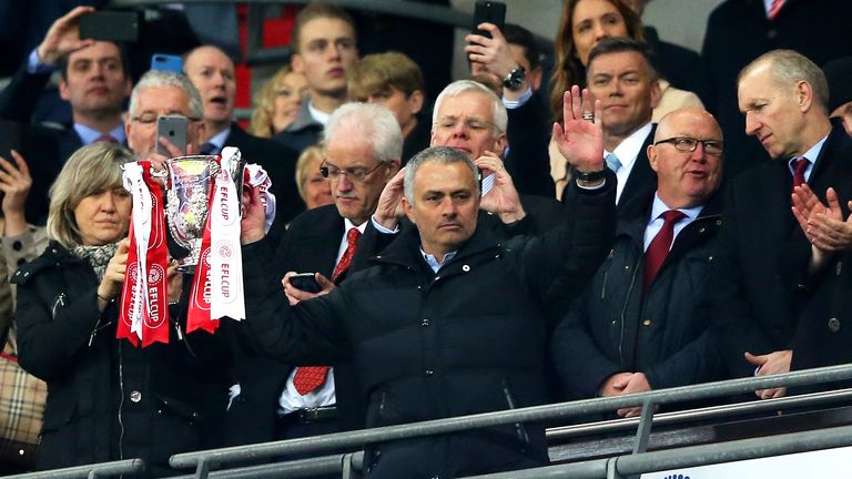 Jose Mourinho lifts the EFL Cup after defeating Southampton in the final at Wembley