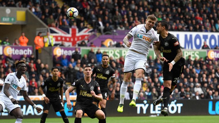 SWANSEA, WALES - SEPTEMBER 10:  Joselu of Newcastle United heads on goal during the Premier League match between Swansea City and Newcastle United at Liber