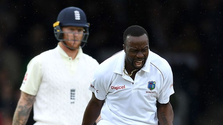 Windies' Kemar Roach celebrates dismissing Dawid Malan for 20 on day two of the third Test