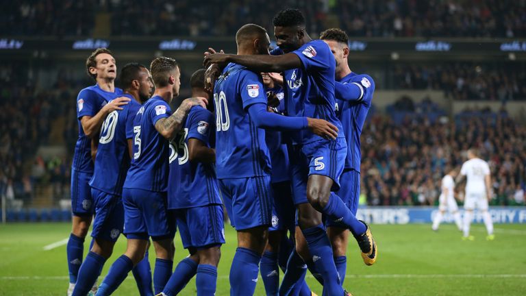 Cardiff City's Kenneth Zohore (centre) celebrates scoring his side's first goal of the game with teammates during the Sky Bet Championship game at the Card