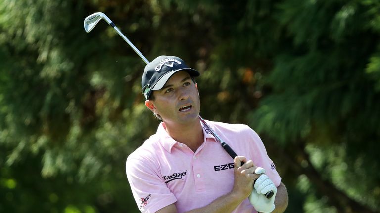 Kevin Kisner of the United States plays his shot from the 11th tee during the third round of the Tour Championship at East Lake