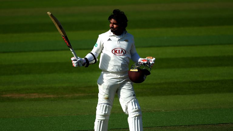 Surrey's Kumar Sangakkara celebrates his century during day two of the Specsavers County Championship Division One match be