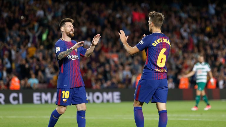Barcelona's midfielder from Spain Denis Suarez (R) celebrates  with Barcelona's forward from Argentina Lionel Messi after scoring during the Spanish league