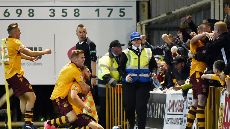 Louis Moult (on knees) celebrates his goal to make it 3-0