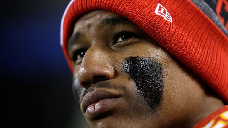 New England Patriots cornerback Marcus Peters sits on the sidelines during AFC play-off against the Pittsburgh Steelers on January 15 in Missouri.