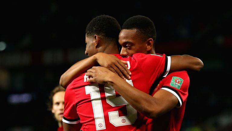 MANCHESTER, ENGLAND - SEPTEMBER 20:  Marcus Rashford of Manchester United celebrates scoring his sides first goal with Henrikh Mkhitaryan of Manchester Uni