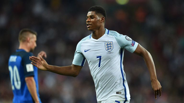 England's striker Marcus Rashford celebrates scoring England's second goal during the World Cup 2018 qualification match