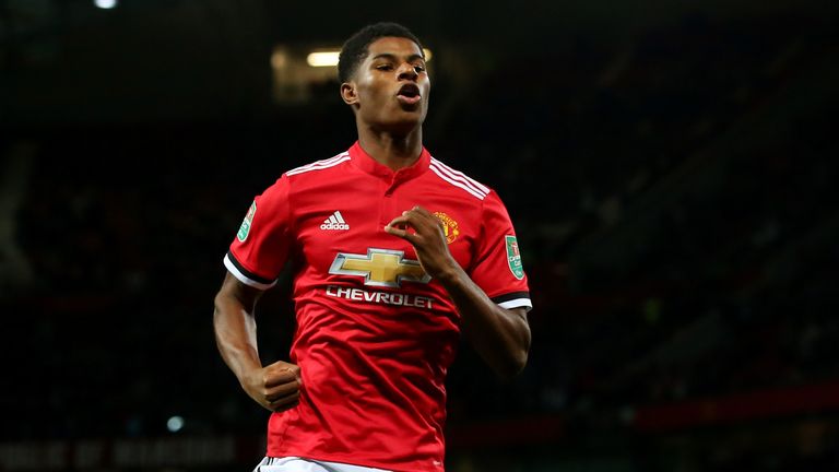 MANCHESTER, ENGLAND - SEPTEMBER 20: Marcus Rashford of Manchester United celebrates scoring his sides first goal during the Carabao Cup Third Round match b
