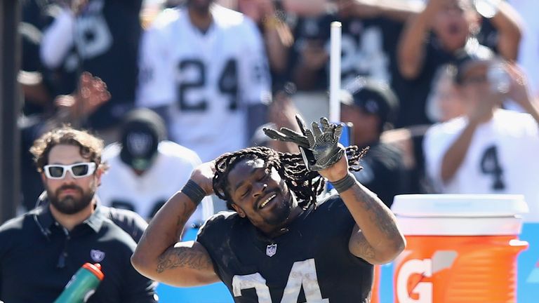 OAKLAND, CA - SEPTEMBER 17:  Marshawn Lynch #24 of the Oakland Raiders dances on the sideline during their win over the New York Jets at Oakland-Alameda Co