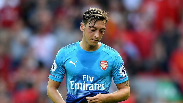 LIVERPOOL, ENGLAND - AUGUST 27:  Mesut Ozil of Arenal is dejected after the Premier League match between Liverpool and Arsenal at Anfield on August 27, 201