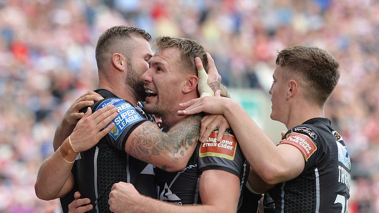 17/09/2017 Wigan Warriors v Castleford Tigers - DW Stadium, Wigan - Castleford's Michael Shenton is congratulated by his team-mates after scoring