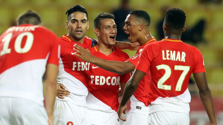 Monaco's Colombian forward Radamel Falcao (C) celebrates with teammates after scoring a goal during the French L1 football match between Monaco and Montpel
