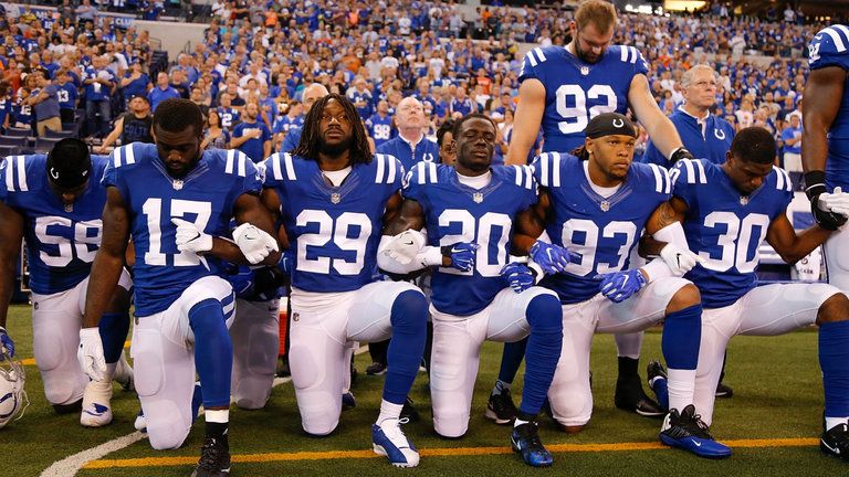 Indianapolis Colts players choose to kneel during the national anthem 