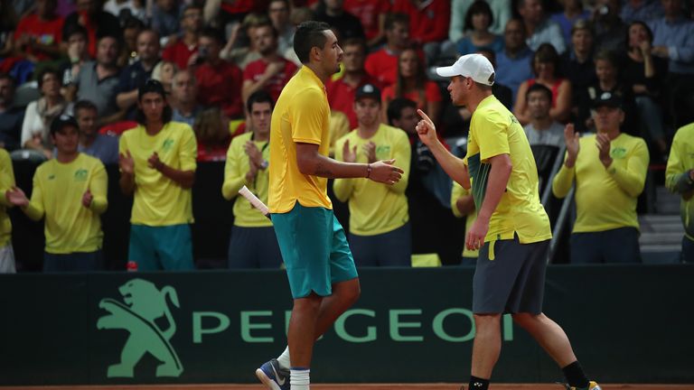 BRUSSELS, BELGIUM - SEPTEMBER 15:  Nick Kyrgios of Australia receives support from Captain Lleyton Hewitt of Australia in his match against Steve Darcis of