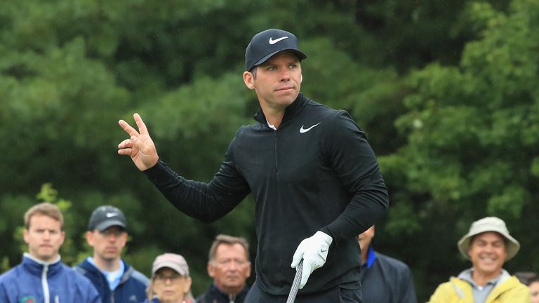 Paul Casey of England reacts after playing his shot from the third tee during round three of the Dell Technologies Championship