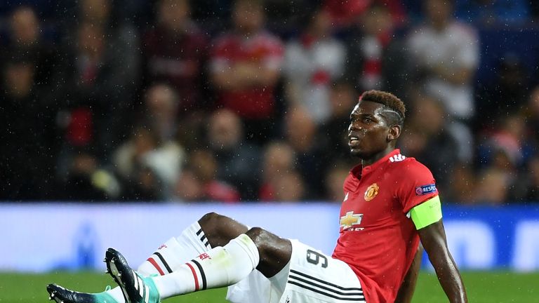 Paul Pogba goes down injured 