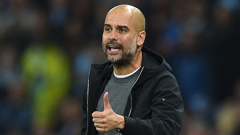 Manchester City's Spanish manager Pep Guardiola shouts instructions to his players from the touchline during the Group F football match between Manchester 