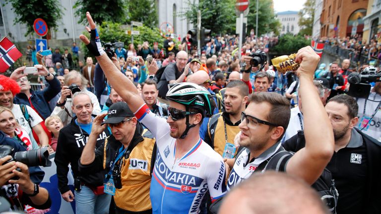 Peter Sagan (C) of Slovakia reacts after winning Men Elite Road Race at the UCI 2017 Road World Championship, in Bergen, on September 24, 2017.
  / AFP PHO