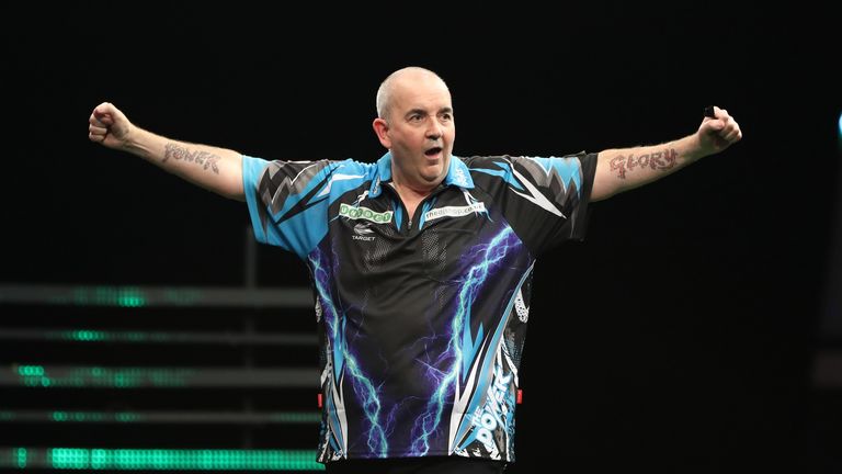 UNIBET CHAMPIONS LEAGUE DARTS.MOTORPOINT ARENA,.CARDIFF.PIC;LAWRENCE LUSTIG.GROUP STAGES.PHIL TAYLOR V RAYMOND VAN BARNEVELD.PHIL TAYLOR  IN ACTION