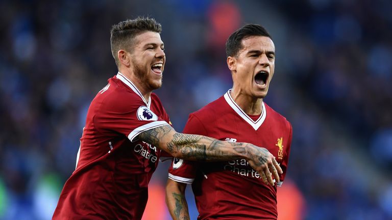 Philippe Coutinho celebrates after putting Liverpool two up at Leicester