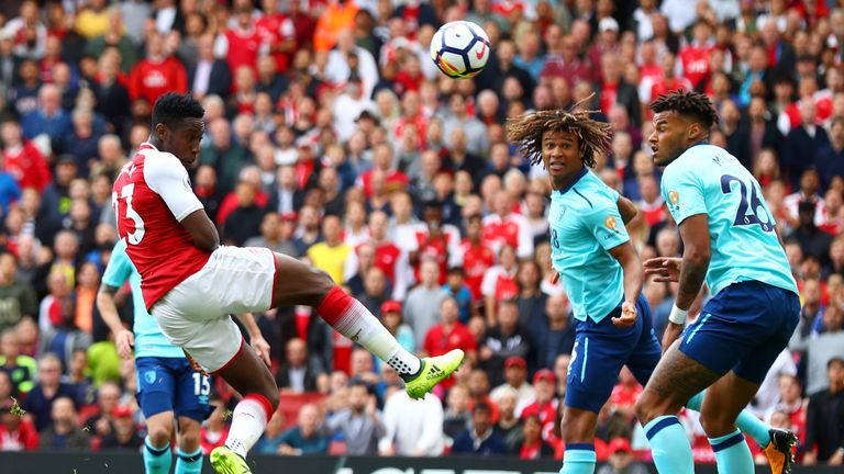 Danny Welbeck scores the opening goal of the game at the Emirates Stadium