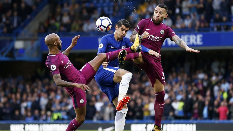 Alvaro Morata is put under pressure by Fabien Delph and Nicloas Otamendi