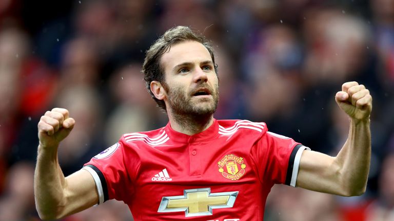 Juan Mata celebrates his early goal for Manchester United