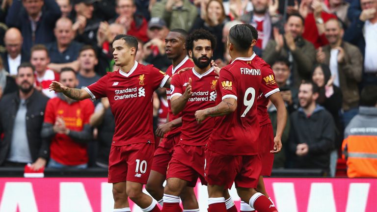 Mohamed Salah celebrates his equaliser in the first half at Anfield