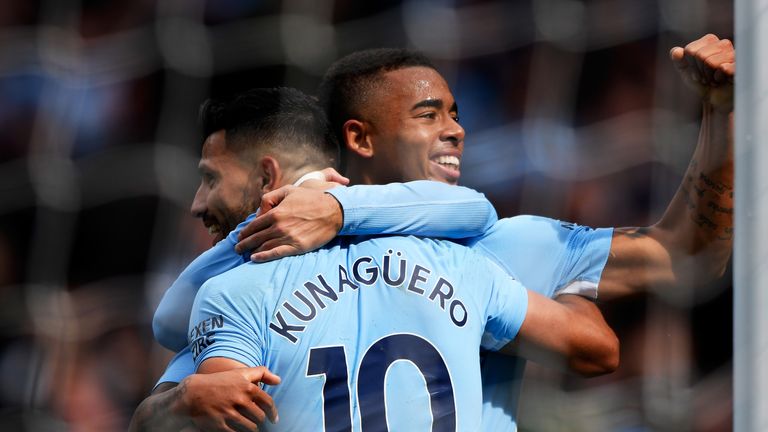 Gabriel Jesus celebrates his second and Manchester City's third goal with Sergio Aguero
