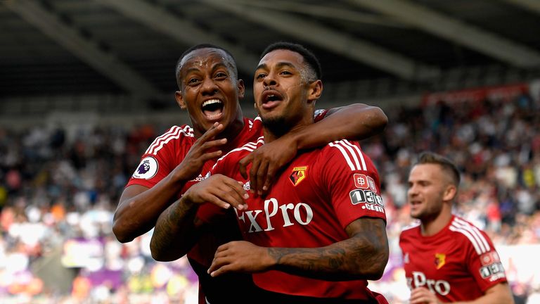 SWANSEA, WALES - SEPTEMBER 23:  Andre Gray (R) of Watford celerbates scoring the opening goal with his team mate Andre Carrilo (L) during the Premier Leagu