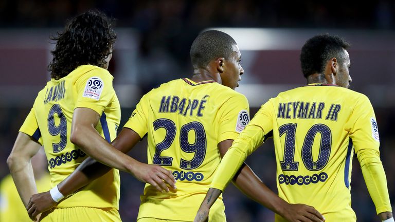 Edinson Cavani celebrates scoring with PSG team-mates Kylian Mbappe and Neymar