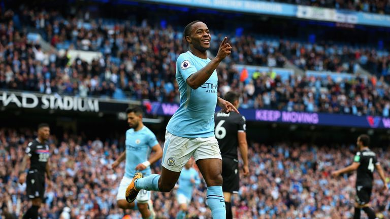 MANCHESTER, ENGLAND - SEPTEMBER 23:  Raheem Sterling of Manchester City celebrates scoring his sides second goal during the Premier League match between Ma
