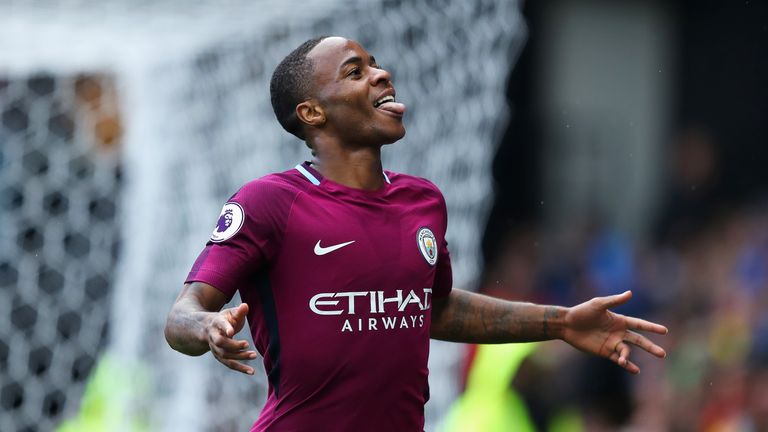 Raheem Sterling celebrates after converting from the penalty spot