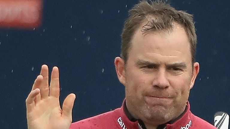 NEWCASTLE UPON TYNE, ENGLAND - SEPTEMBER 30:  Richie Ramsay of Scotland waves to the crowd on the 18th hole during the third round of the British Masters a