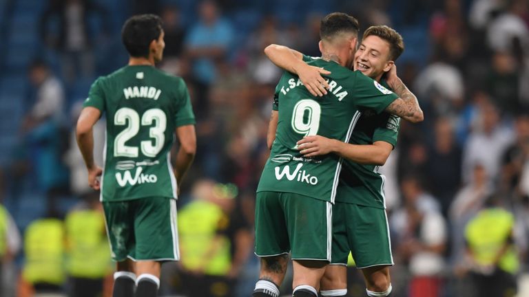 Real Betis' forward from Paraguay Arnaldo Sanabria (2R) celebrates a goal with Real Betis' forward from Spain Francis Guerrero during the Spanish league fo