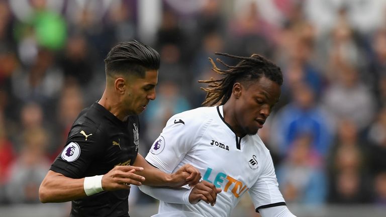 SWANSEA, WALES - SEPTEMBER 10: Renato Sanches of Swansea City and Ayoze Perez of Newcastle United in action during the Premier League match between Swansea
