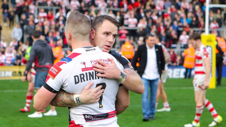 Catalans' Richie Myler consoles Leigh's Josh Drinkwater.