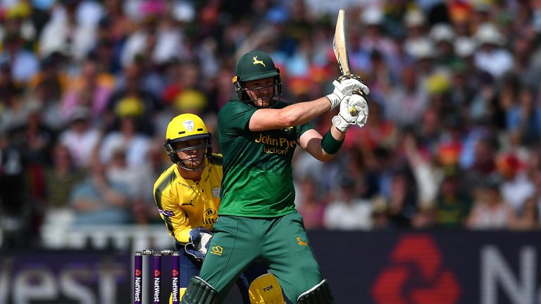 BIRMINGHAM, ENGLAND - SEPTEMBER 02:  Riki Wessels of Notts Outlaws hits out ahead of Calvin Dickinson of Hampshire during the NatWest T20 Blast Semi-Final 