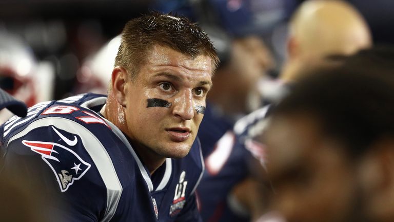 Rob Gronkowski looks on from the sideline during the first half against the Kansas City Chiefs at Gillette Stadium