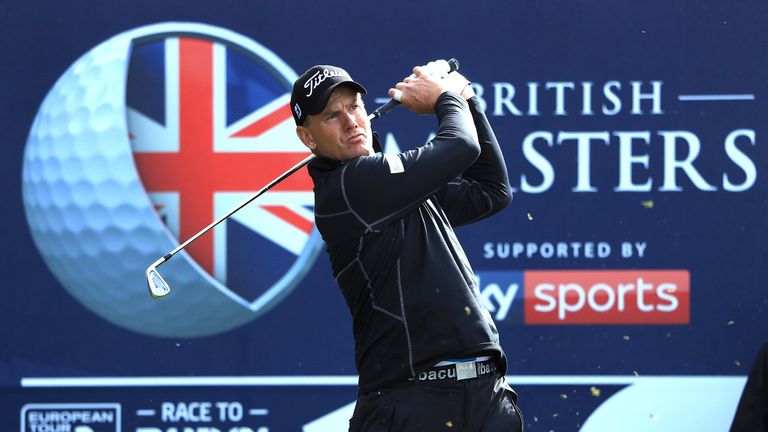 Robert Karlsson of Sweden hits his tee shot on the 18th hole during day two of the British Masters at Close House