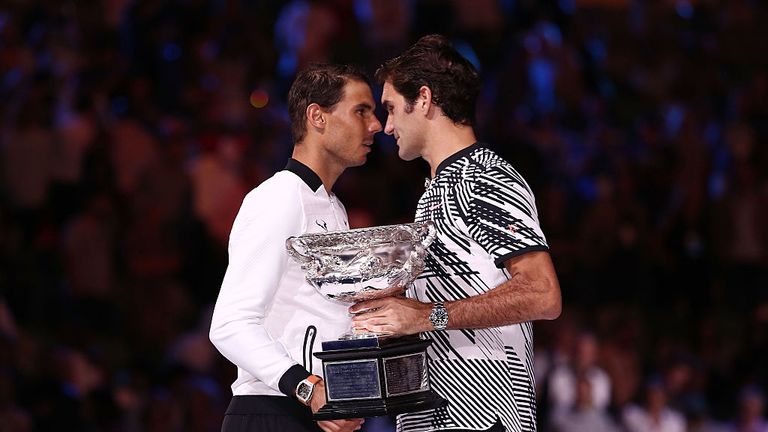 Roger Federer commiserates Rafael Nadal after winning the 2017 Australian Open men's final