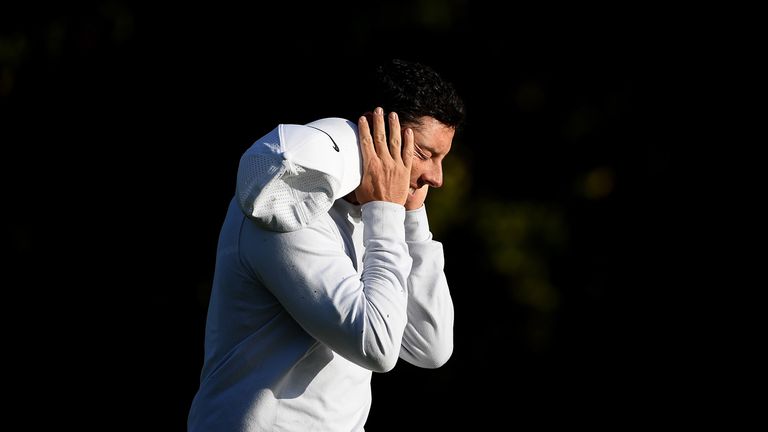 Rory McIlroy of Northern Ireland reacts after his second shot on the 16th hole during day two of the British Masters