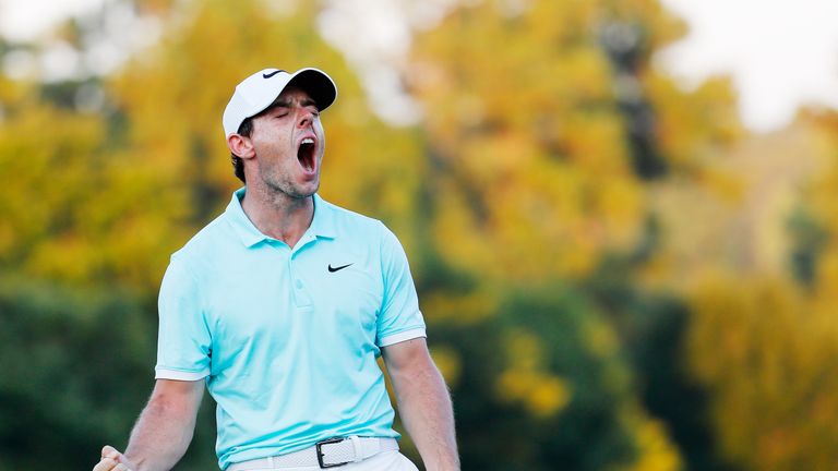 ATLANTA, GA - SEPTEMBER 25:  Rory McIlroy of Northern Ireland celebrates a birdie putt to defeat Ryan Moore on the fourth playoff hole to win the TOUR Cham