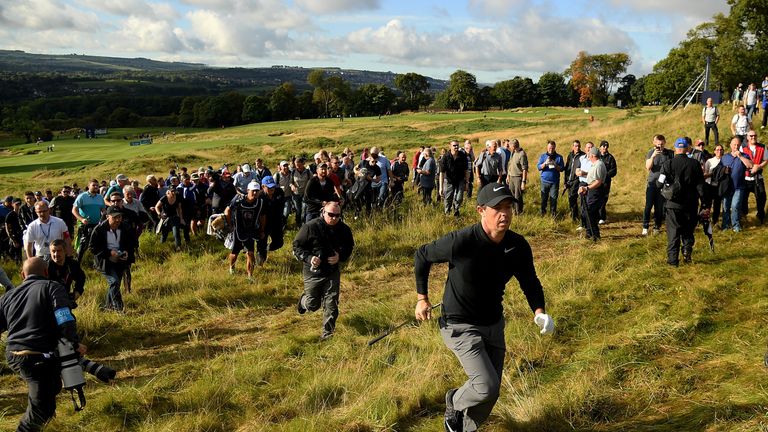 NEWCASTLE UPON TYNE, ENGLAND - SEPTEMBER 28:  Rory McIlroy of Northern Ireland runs to the 17th green during day one of the British Masters at Close House 