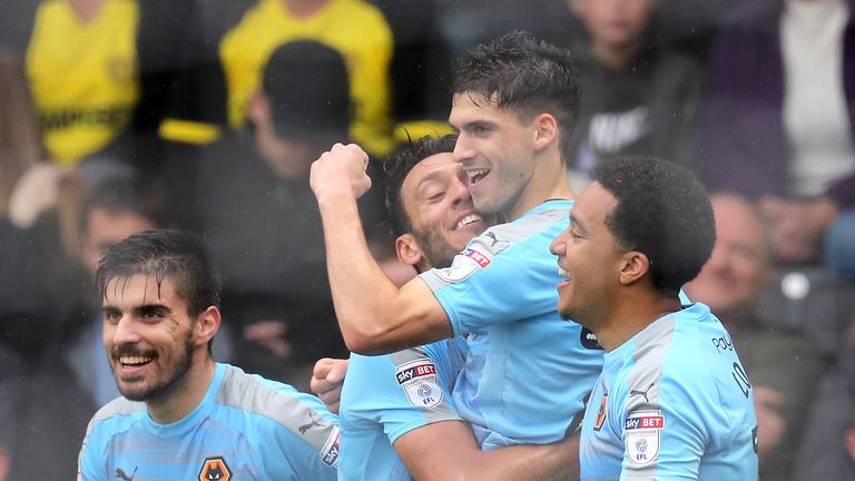 Wolverhampton Wanderers' Ruben Vinagre celebrates with team-mates after scoring his side's third goal of the game