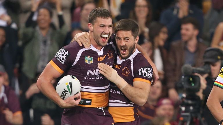 Corey Oates (left) scored a try but was later stretchered off