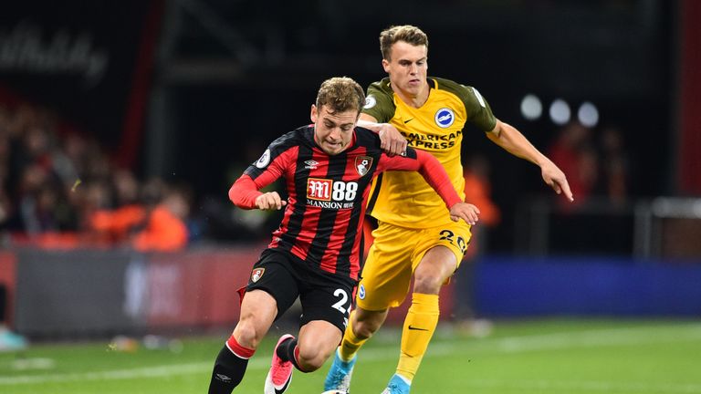 Ryan Fraser drives past Solly March in the first half